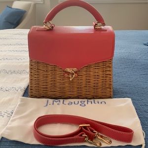 Straw and coral leather handbag